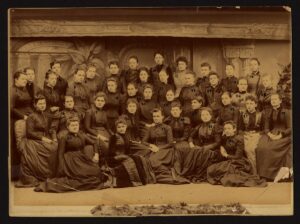 what was the first womens college in america and the first coeducational college