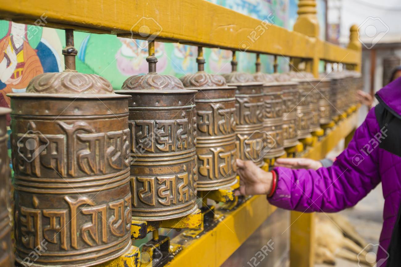 which religion uses a prayer wheel