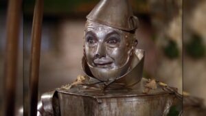 who was originally supposed to play the tin woodsman in the wizard of oz 1939